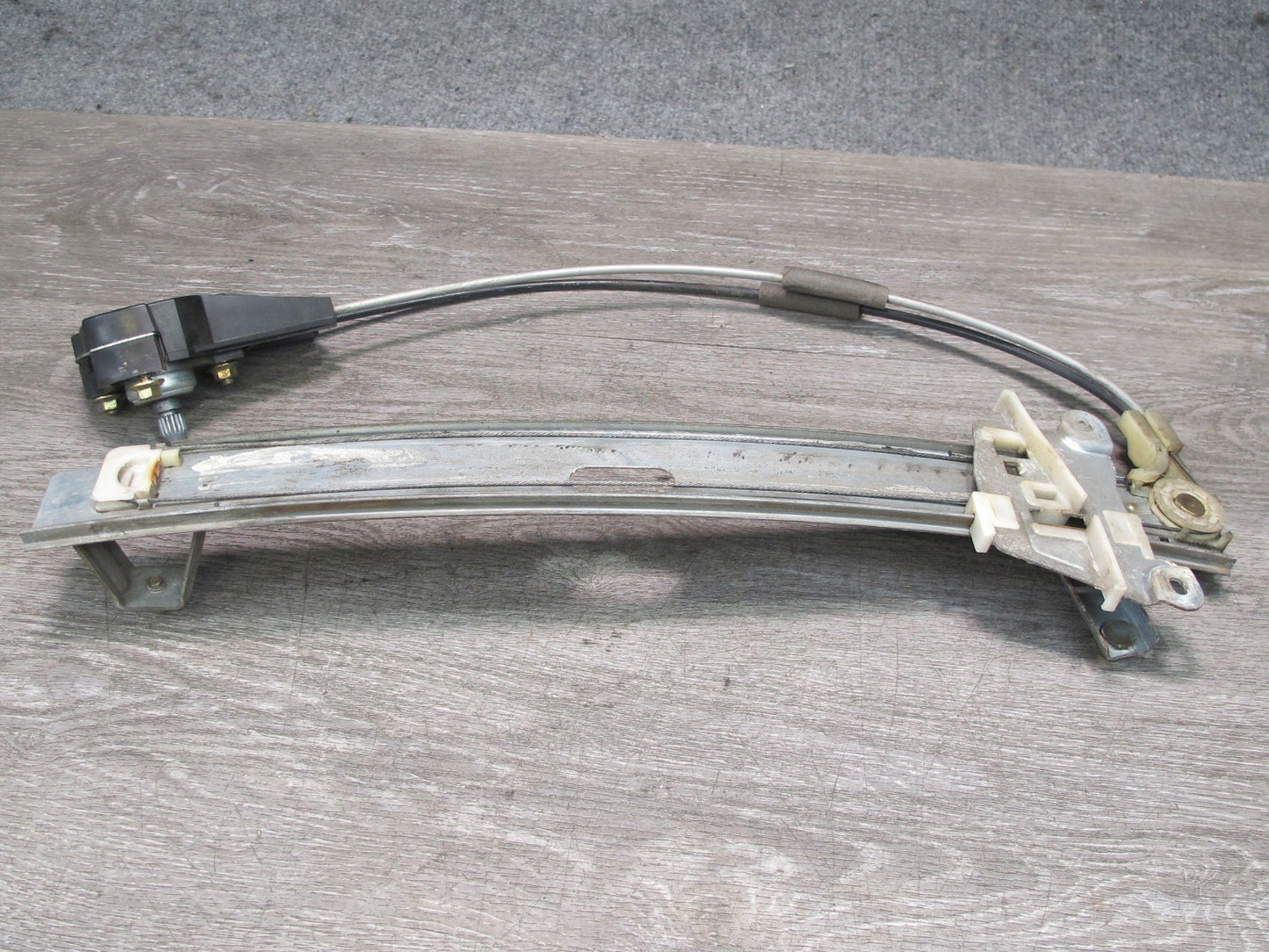 86-91 Mazda RX7 Coupe Left Driver Door Manual Window Regulator OEM