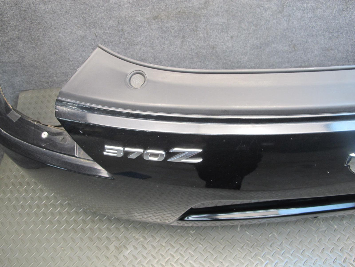 09-20 Nissan Z34 370Z Rear Bumper Cover Panel Black w Emblem OEM