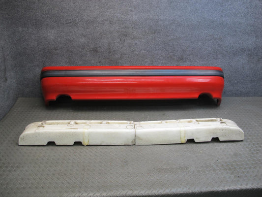 86-88 Mazda RX7 Rear Bumper Cover Dual Exhaust w Impact Foam Absorber OEM