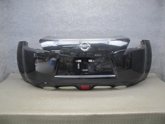 09-20 Nissan Z34 370Z Rear Bumper Cover Panel Black w Emblem OEM