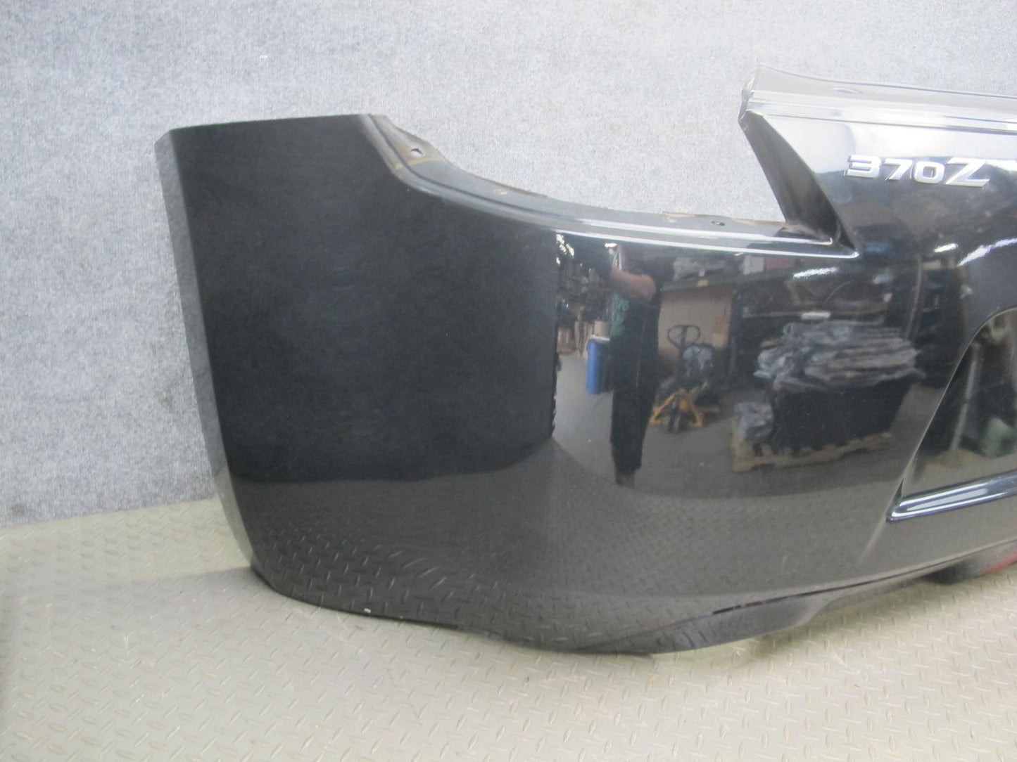 09-20 Nissan Z34 370Z Rear Bumper Cover Panel Black w Emblem OEM