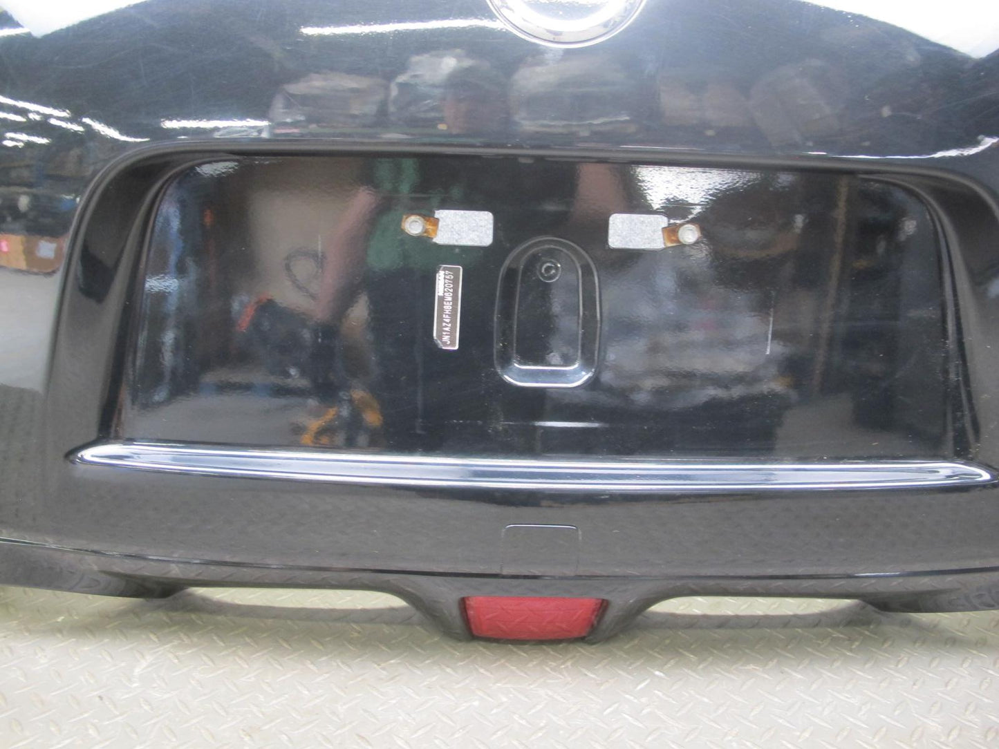09-20 Nissan Z34 370Z Rear Bumper Cover Panel Black w Emblem OEM