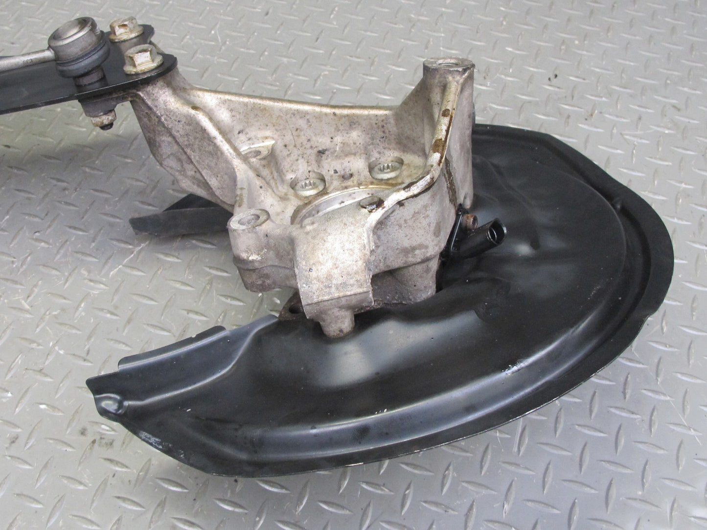 12-13 VW Golf R MK6 AWD Rear Left Spindle Knuckle Wheel Hub w Trailing Arm OEM
