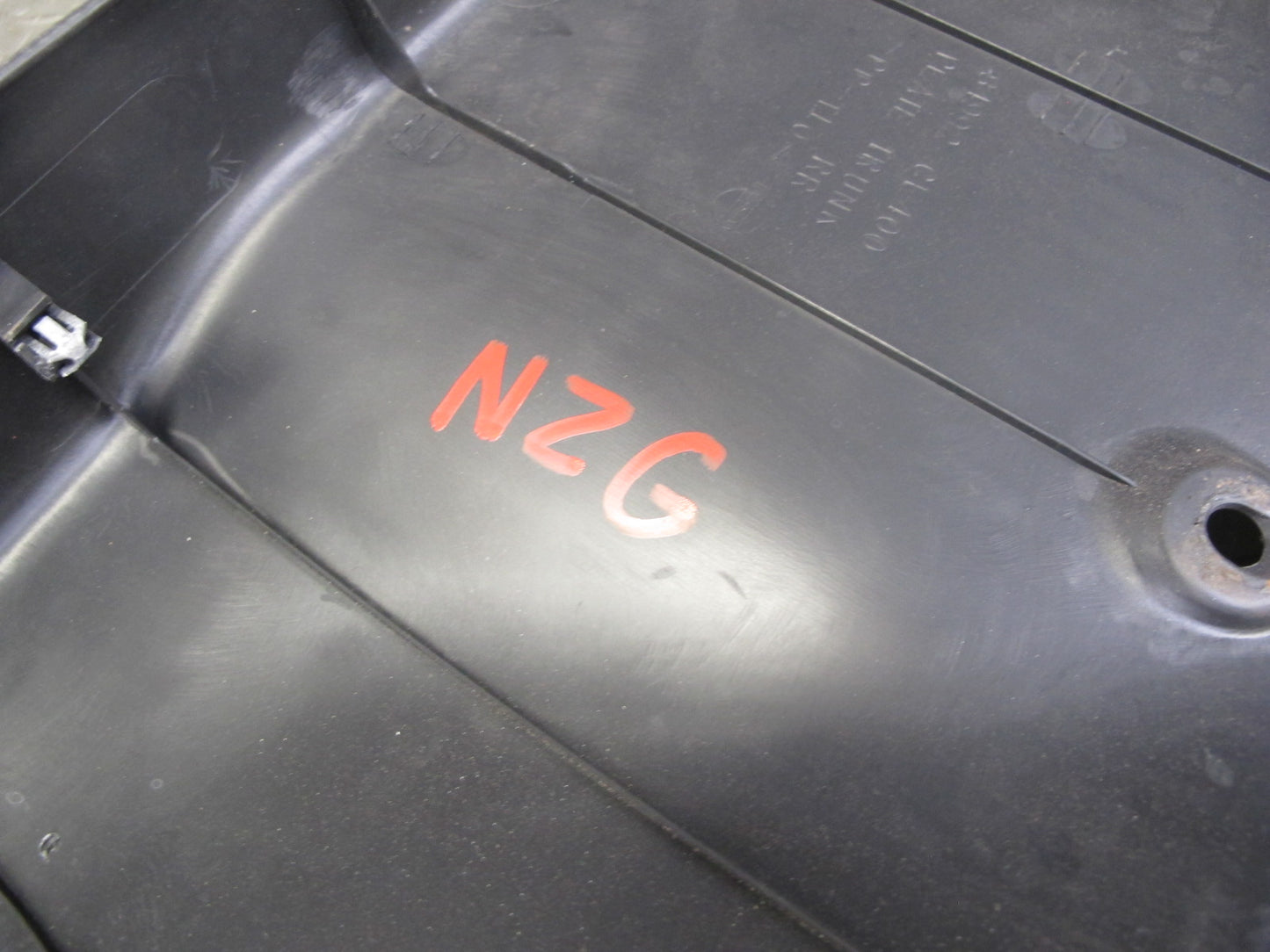 04-09 Nissan 350Z Z33 Convertible Rear Trunk Latch Trim Cover Panel Black OEM