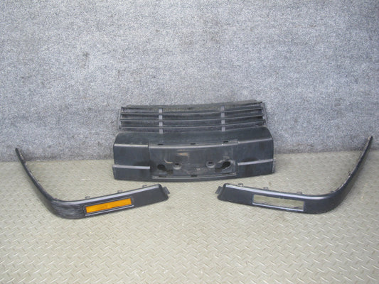 89-95 BMW E34 5SERIES Front Bumper License Plate w Left Right Side Strip Set OEM