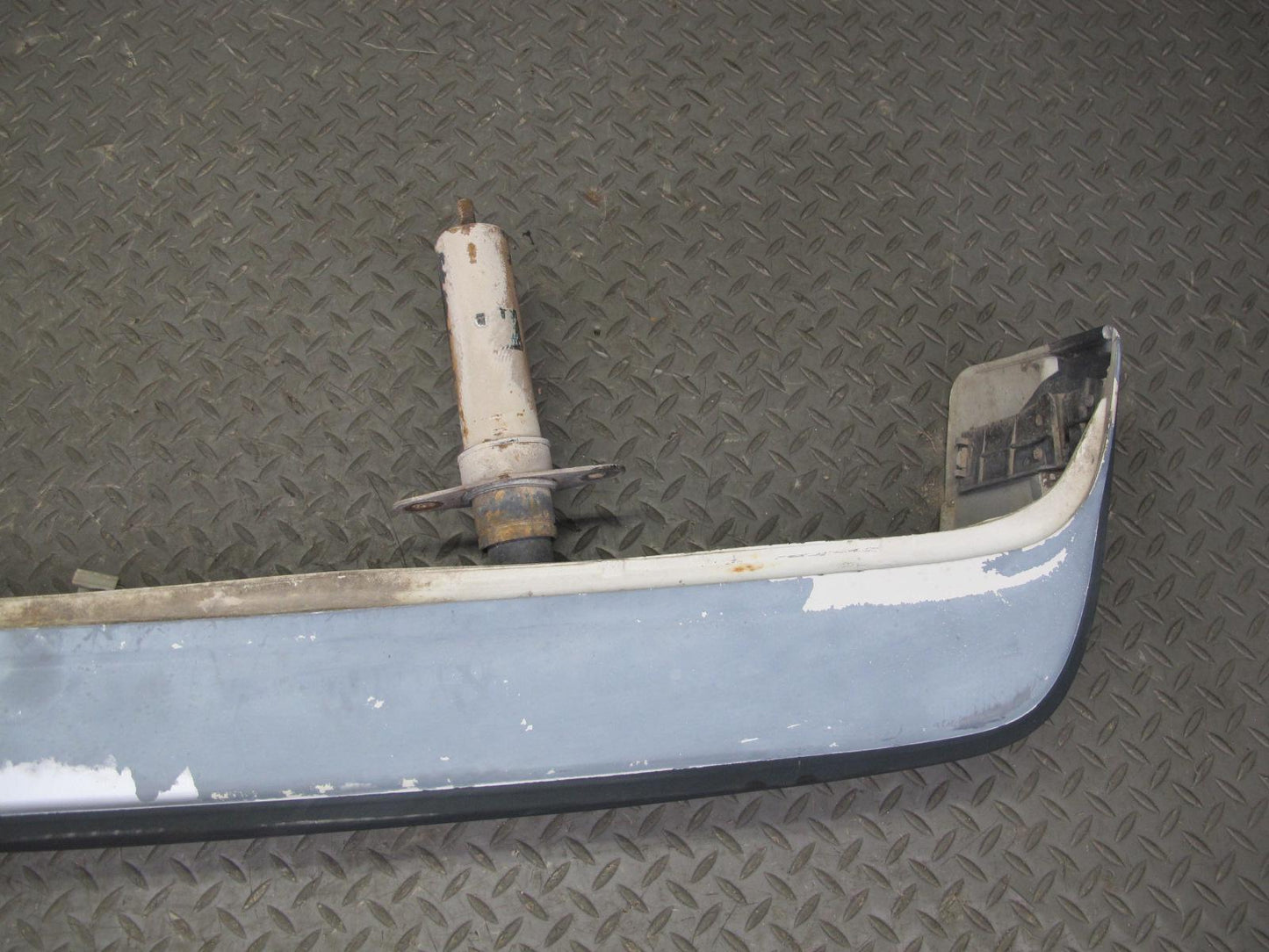 84-85 Mazda RX7 FB Rear Bumper Cover Dover White w Shock Absorber OEM