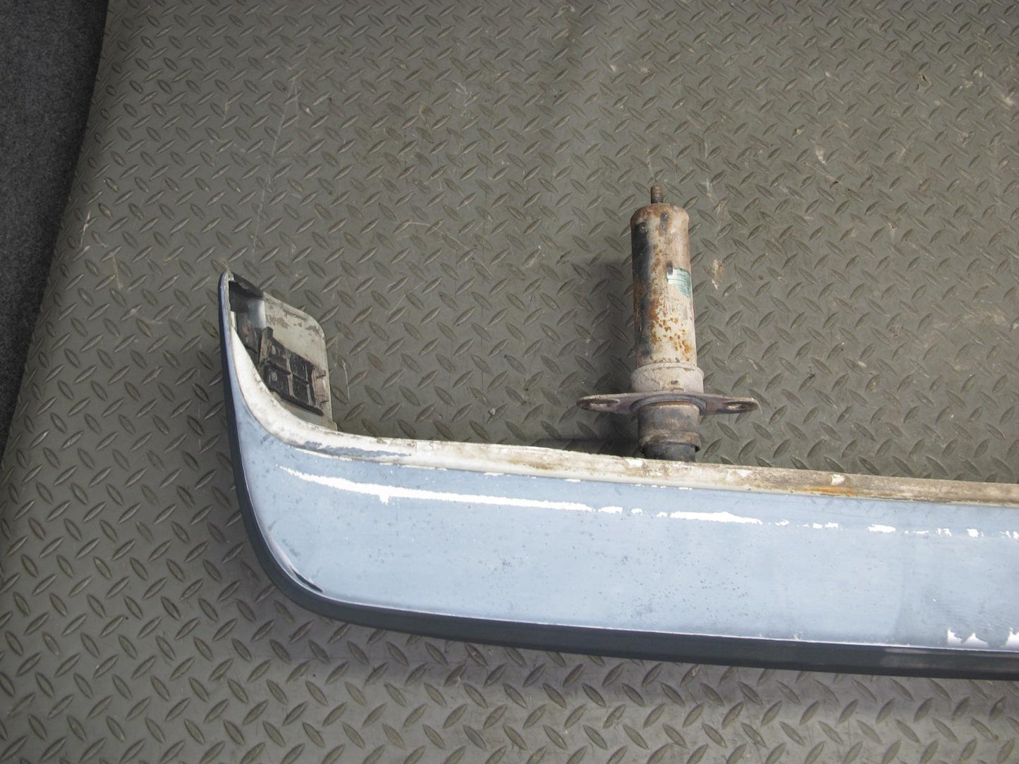 84-85 Mazda RX7 FB Rear Bumper Cover Dover White w Shock Absorber OEM