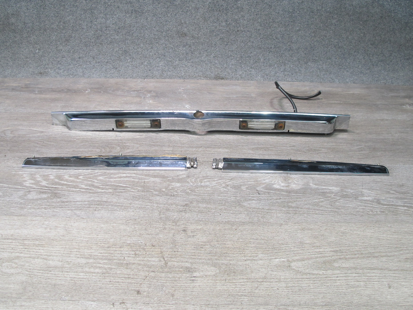 73-89 Mercedes R107 Rear Trunk Lid License Plate Light Lamp Chrome Molding OEM