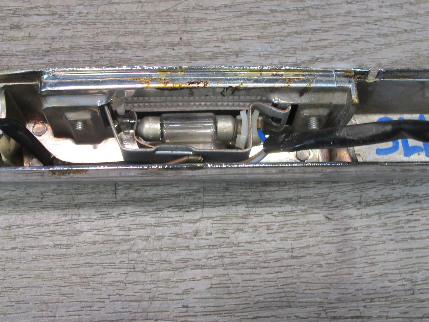 73-89 Mercedes R107 Rear Trunk Lid License Plate Light Lamp Chrome Molding OEM