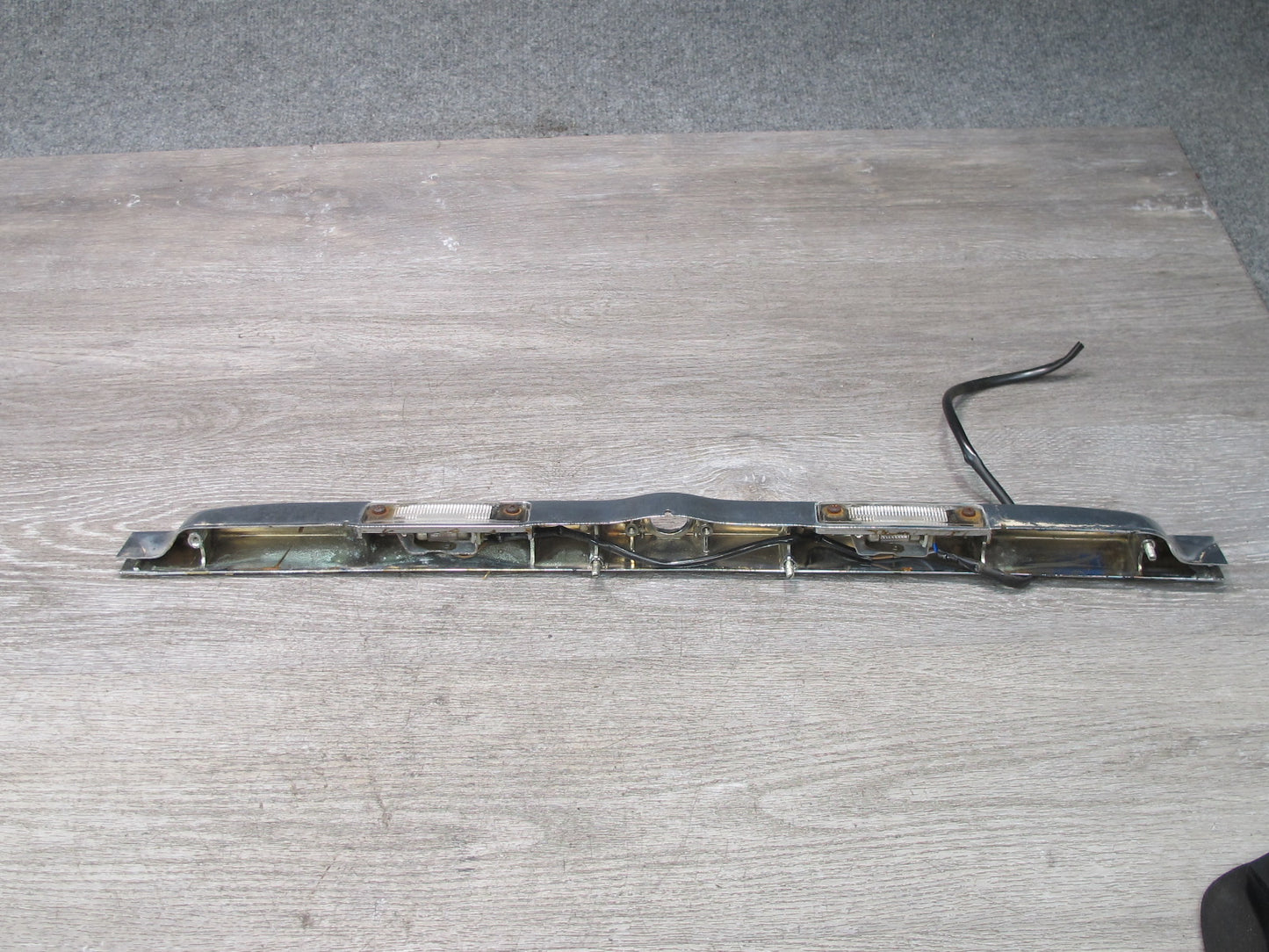 73-89 Mercedes R107 Rear Trunk Lid License Plate Light Lamp Chrome Molding OEM