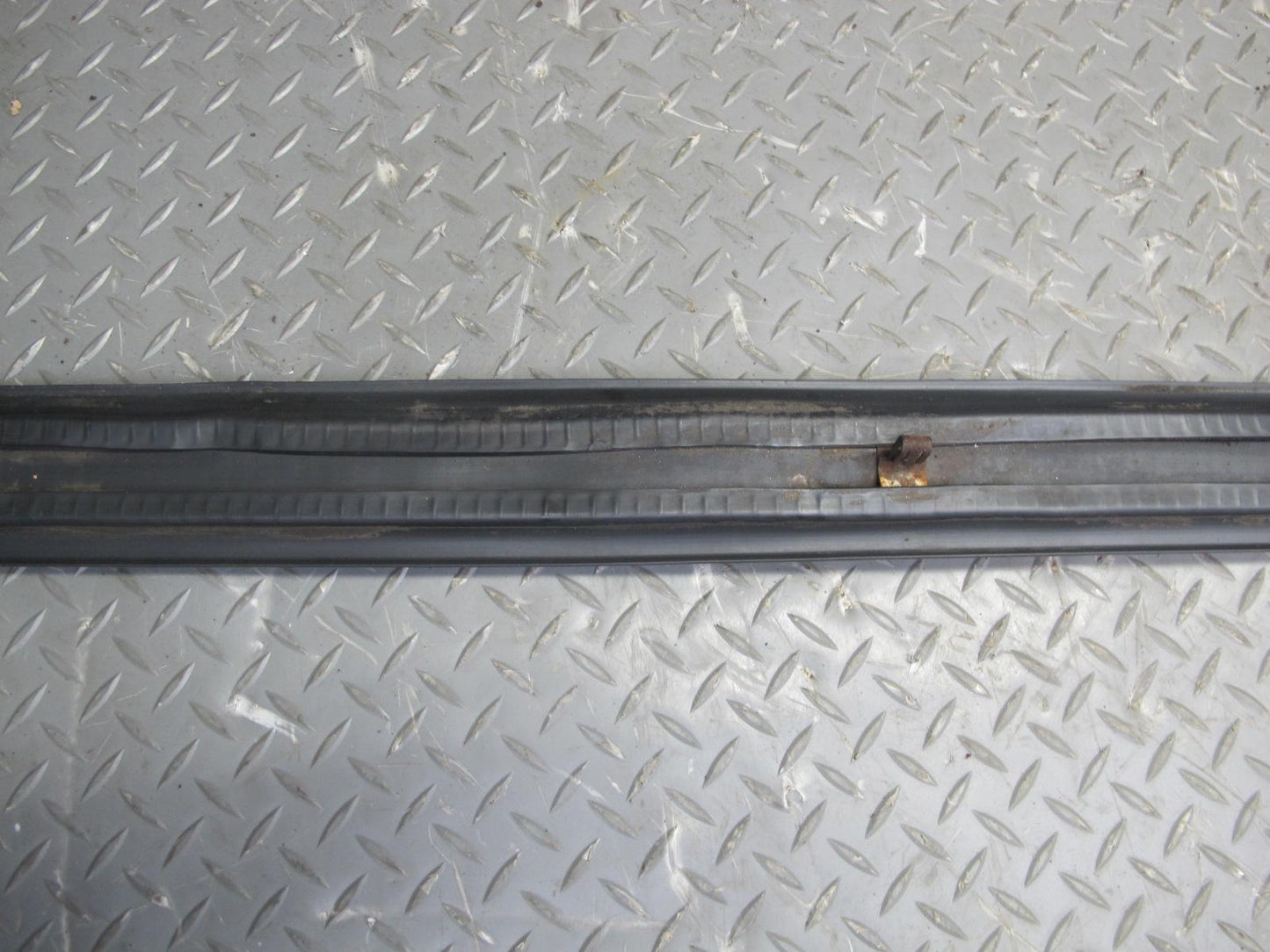 87-90 BMW E30 3-SERIES Rear Bumper Impact Rubber Strip Molding OEM