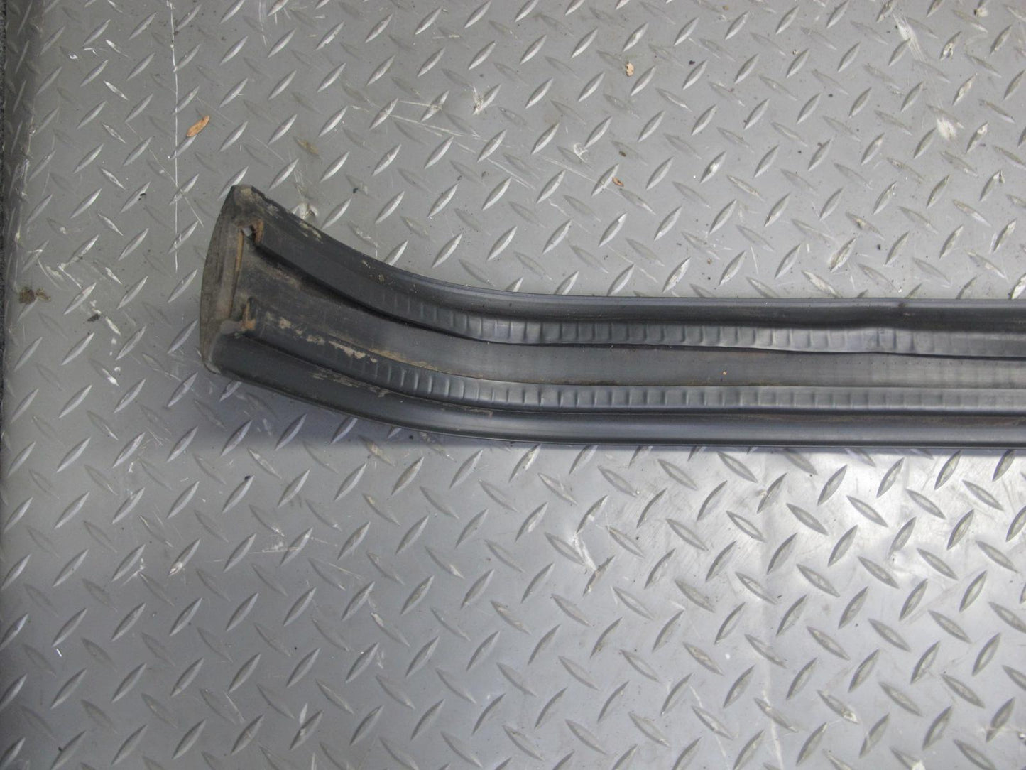 87-90 BMW E30 3-SERIES Rear Bumper Impact Rubber Strip Molding OEM