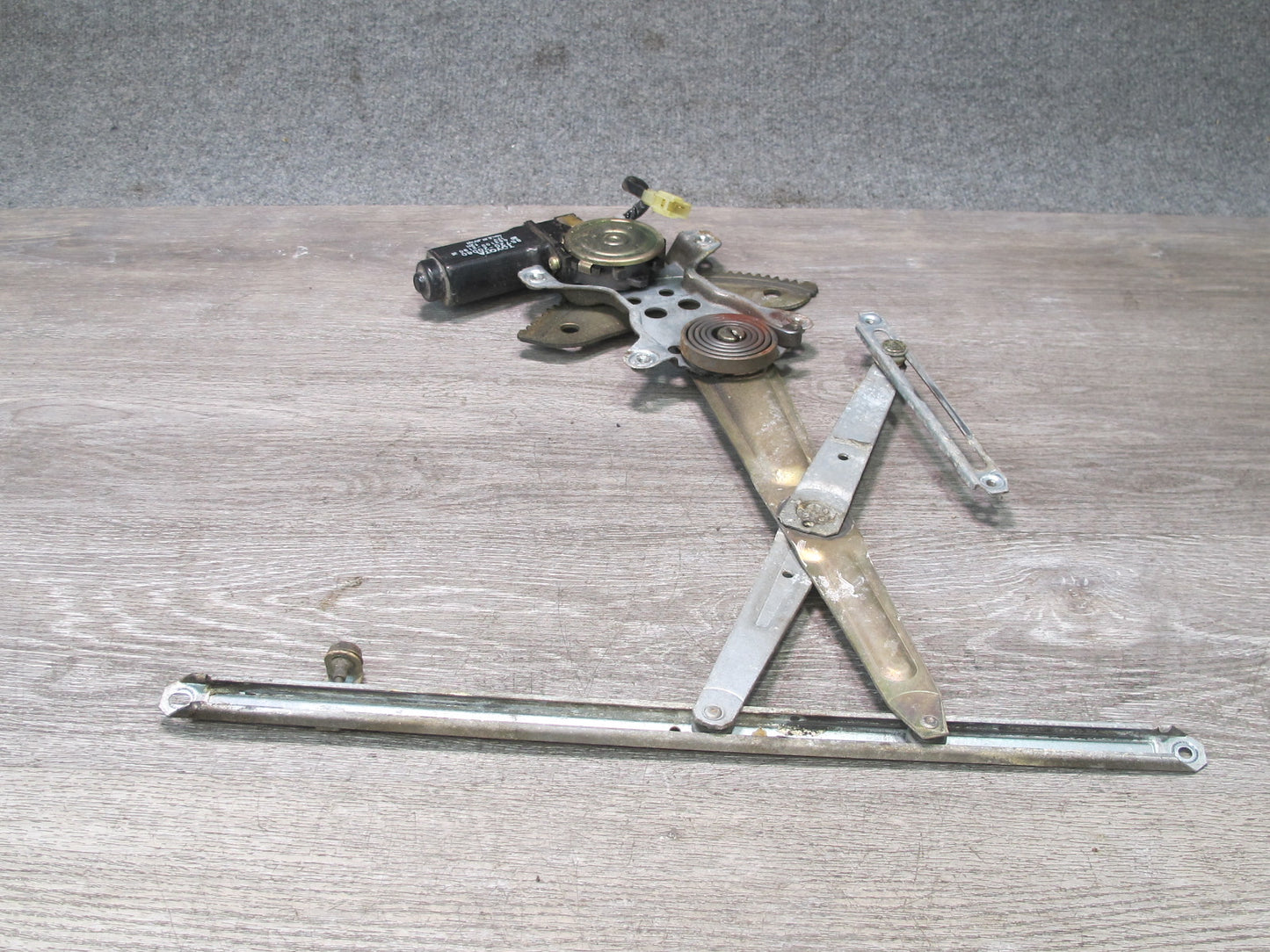 86-92 Toyota Supra MA70L Left Driver Door Window Regulator w Motor OEM