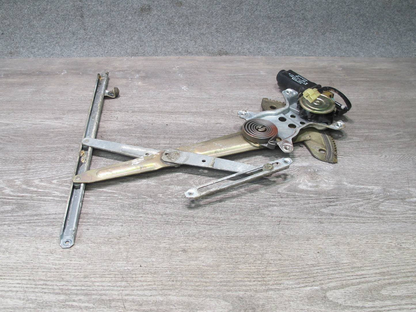 86-92 Toyota Supra MA70L Left Driver Door Window Regulator w Motor OEM