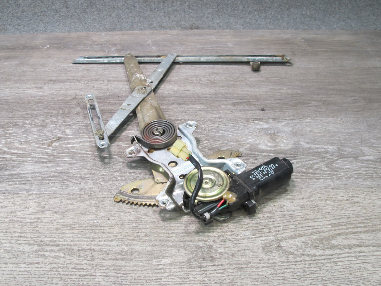86-92 Toyota Supra MA70L Left Driver Door Window Regulator w Motor OEM