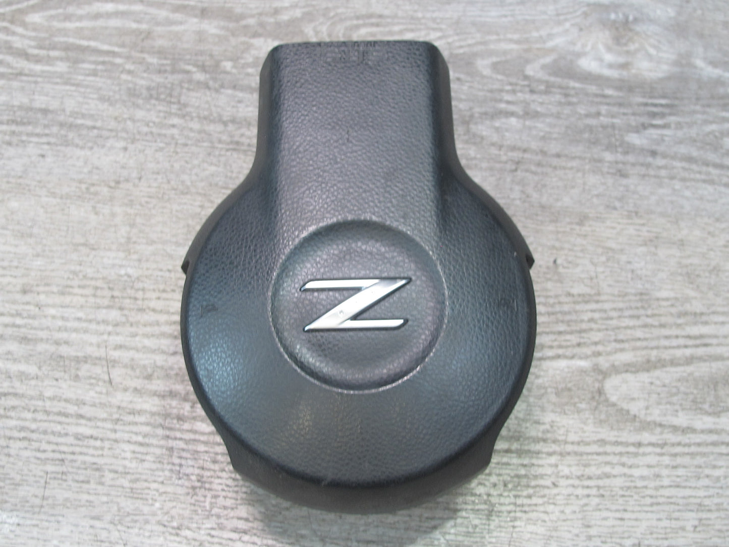 06-09 NISSAN 350Z Z33 FRONT LEFT DRIVER SIDE STEERING WHEEL SRS AIRBAG OEM