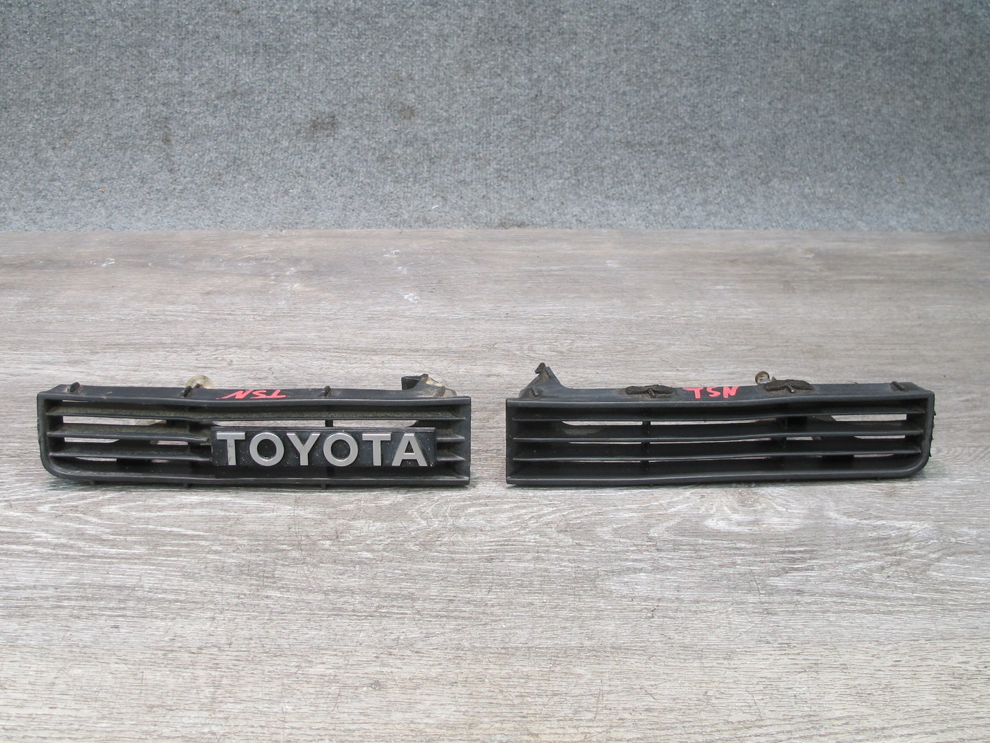 89-92 Toyota Supra MA70L Set of 2 Front Bumper Left & Right Trim Grille Logo OEM