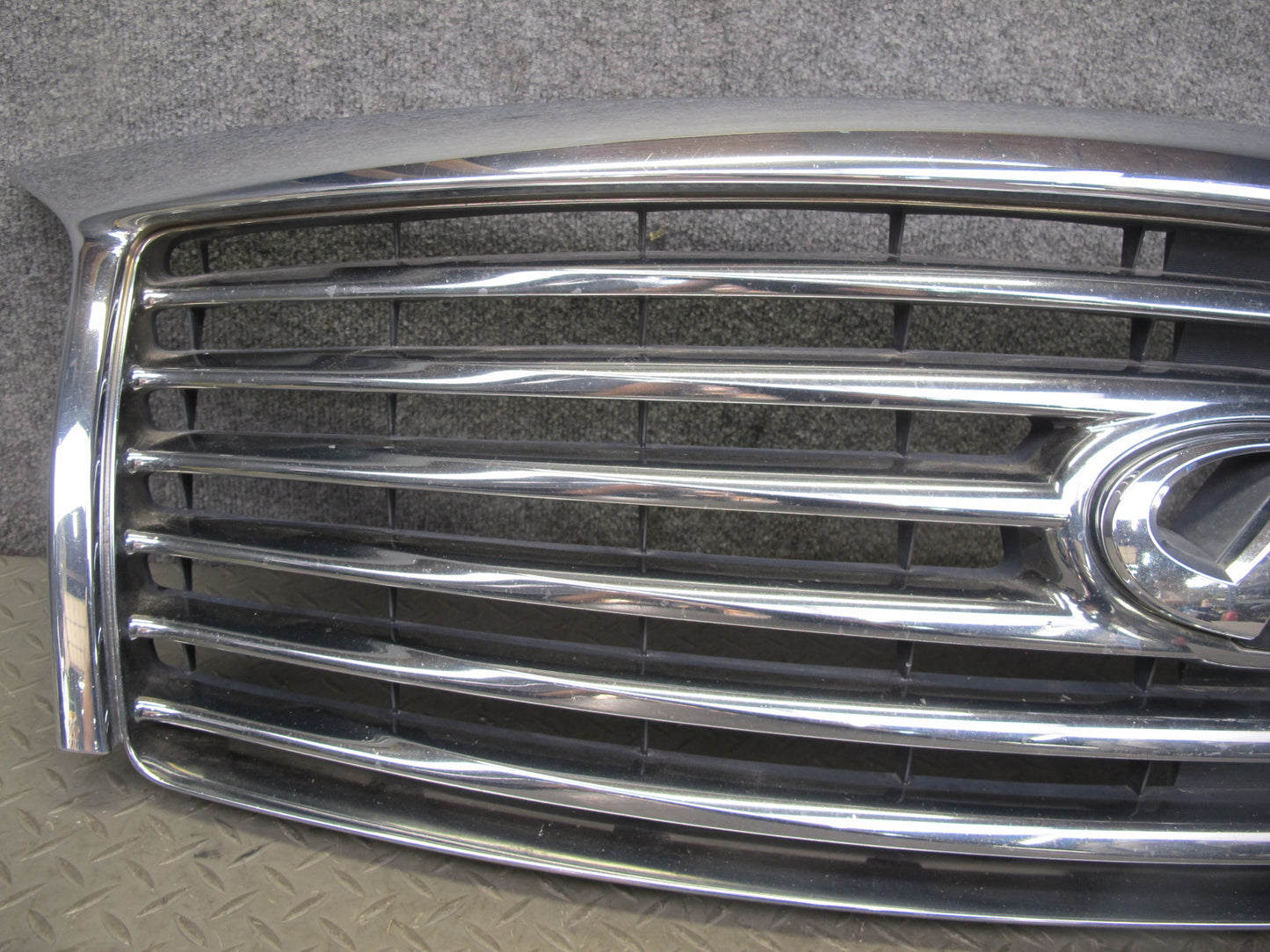 2011-2012 Infiniti QX56 Front Bumper Upper Chrome Grille W/ Camera
