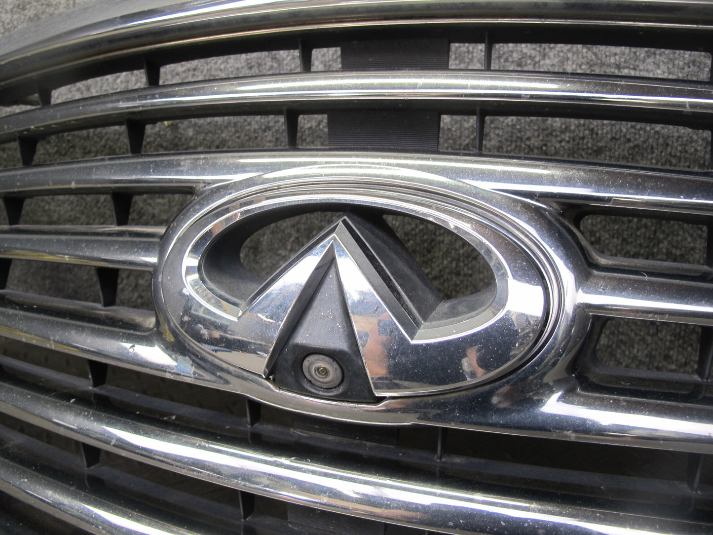 2011-2012 Infiniti QX56 Front Bumper Upper Chrome Grille W/ Camera