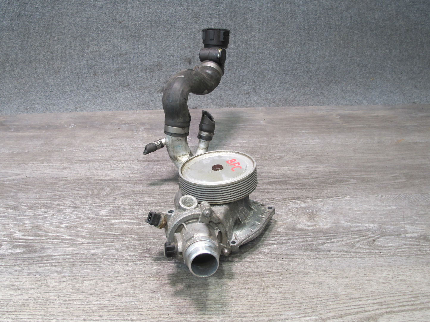 11-16 BMW F12 F10 550i N63 Engine Coolant Water Pump w Thermostat Housing OEM