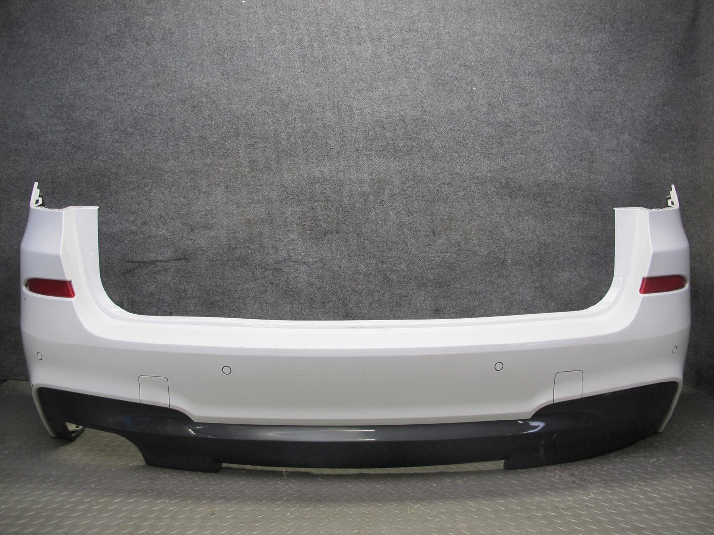 11-14 BMW F25 X3 M-sport Rear Bumper Cower w PDC Sensors OEM