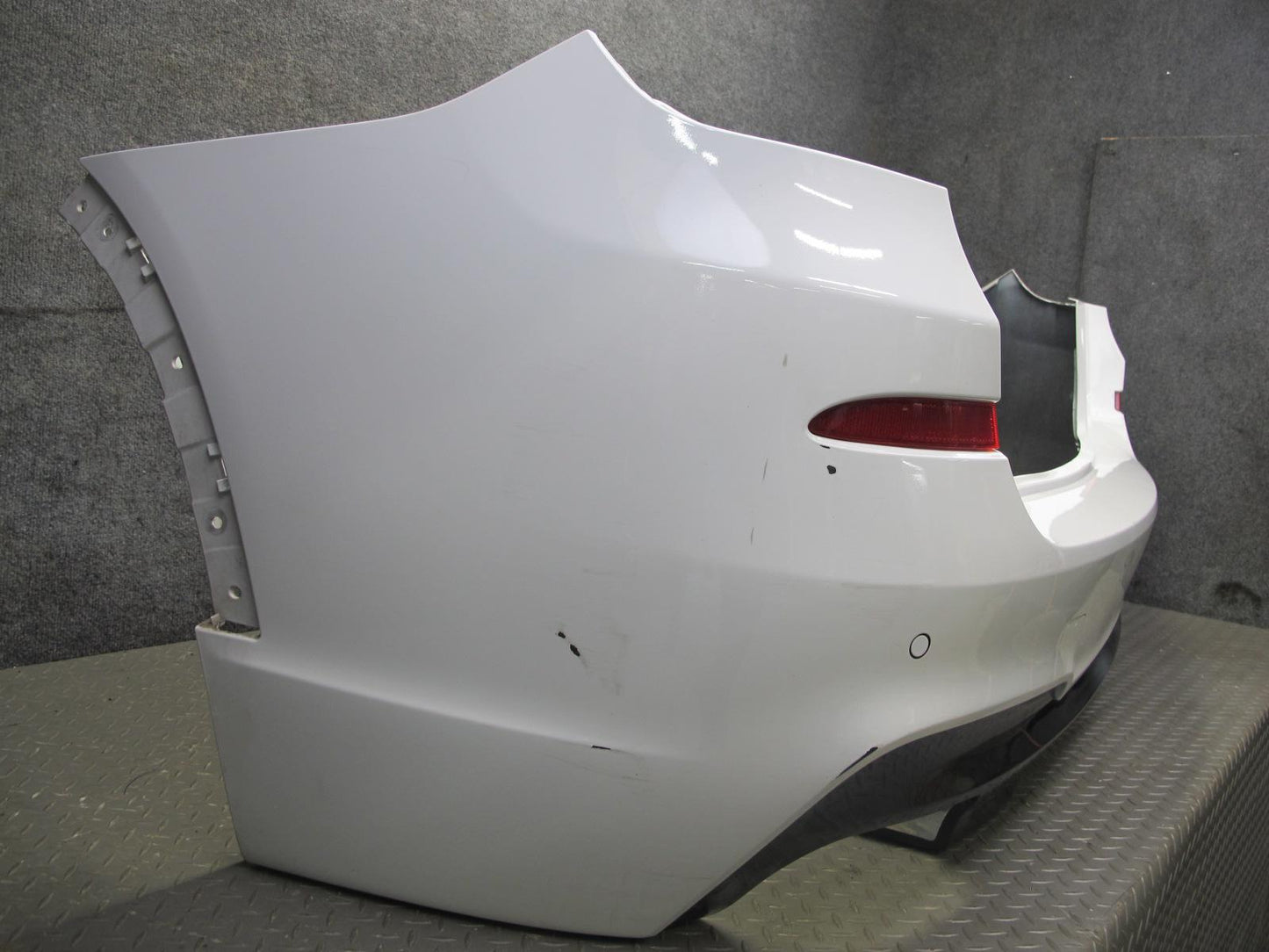 11-14 BMW F25 X3 M-sport Rear Bumper Cower w PDC Sensors OEM