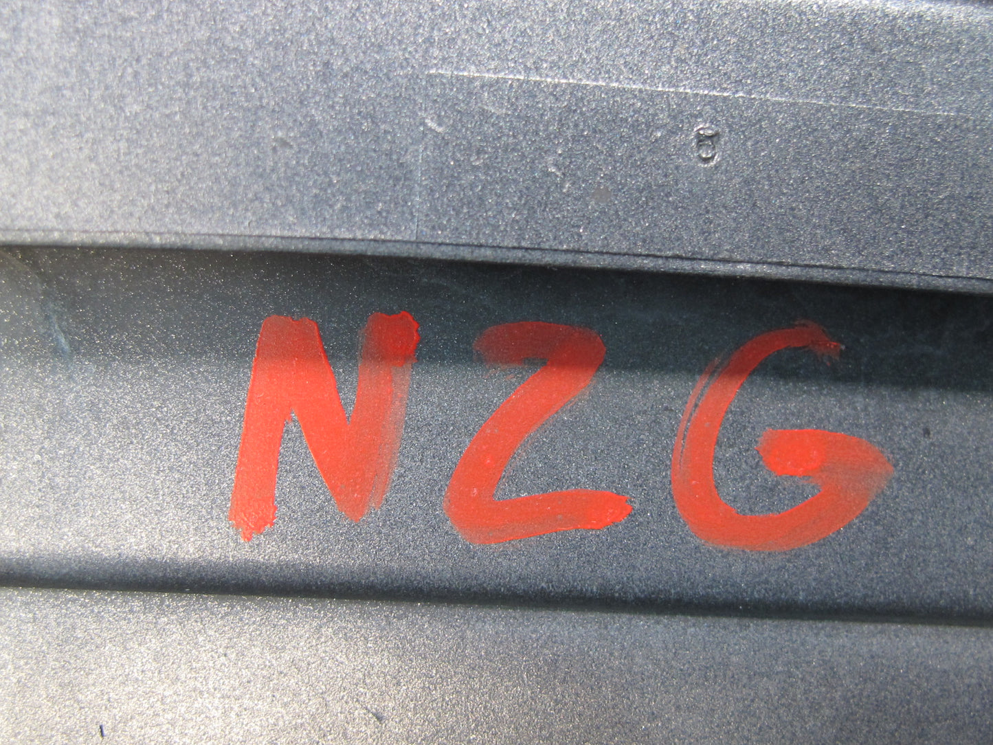 06-09 Nissan Z33 350Z Front Bumper Center Cover Spacer Silver OEM