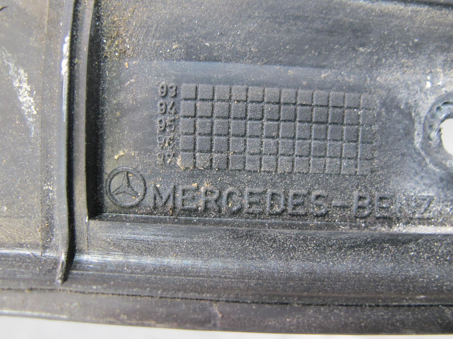 94-95 Mercedes W124 300D Sedan Rear Trunk Lid License Plate Trim Molding OEM