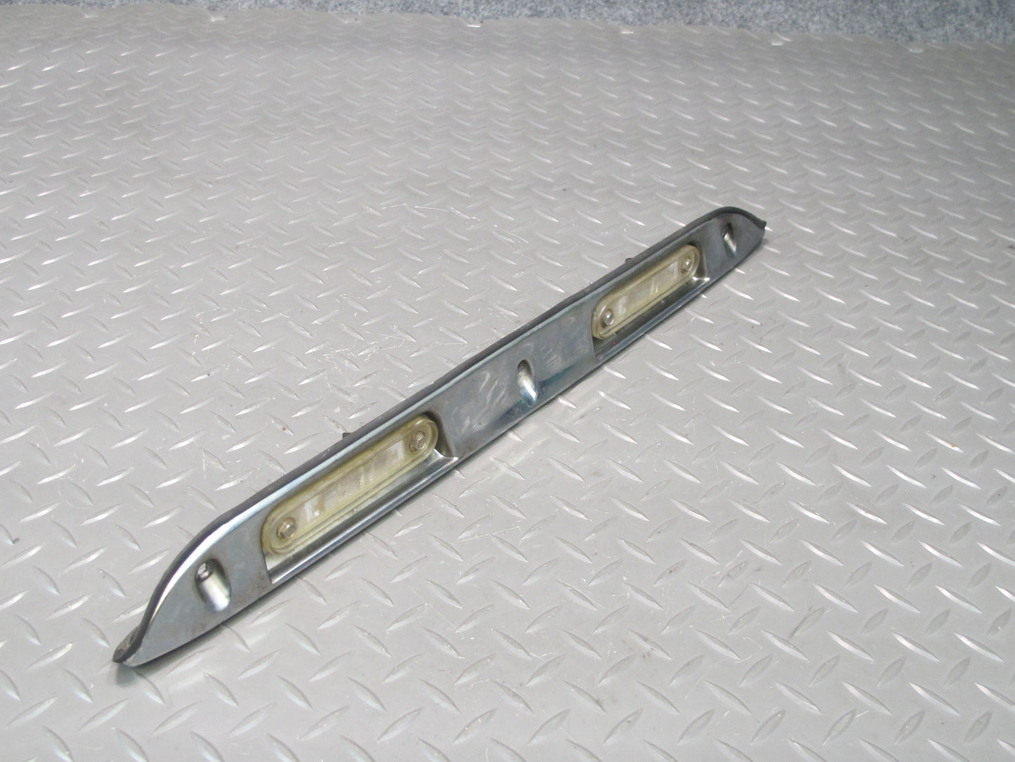 94-95 Mercedes W124 300D Sedan Rear Trunk Lid License Plate Trim Molding OEM