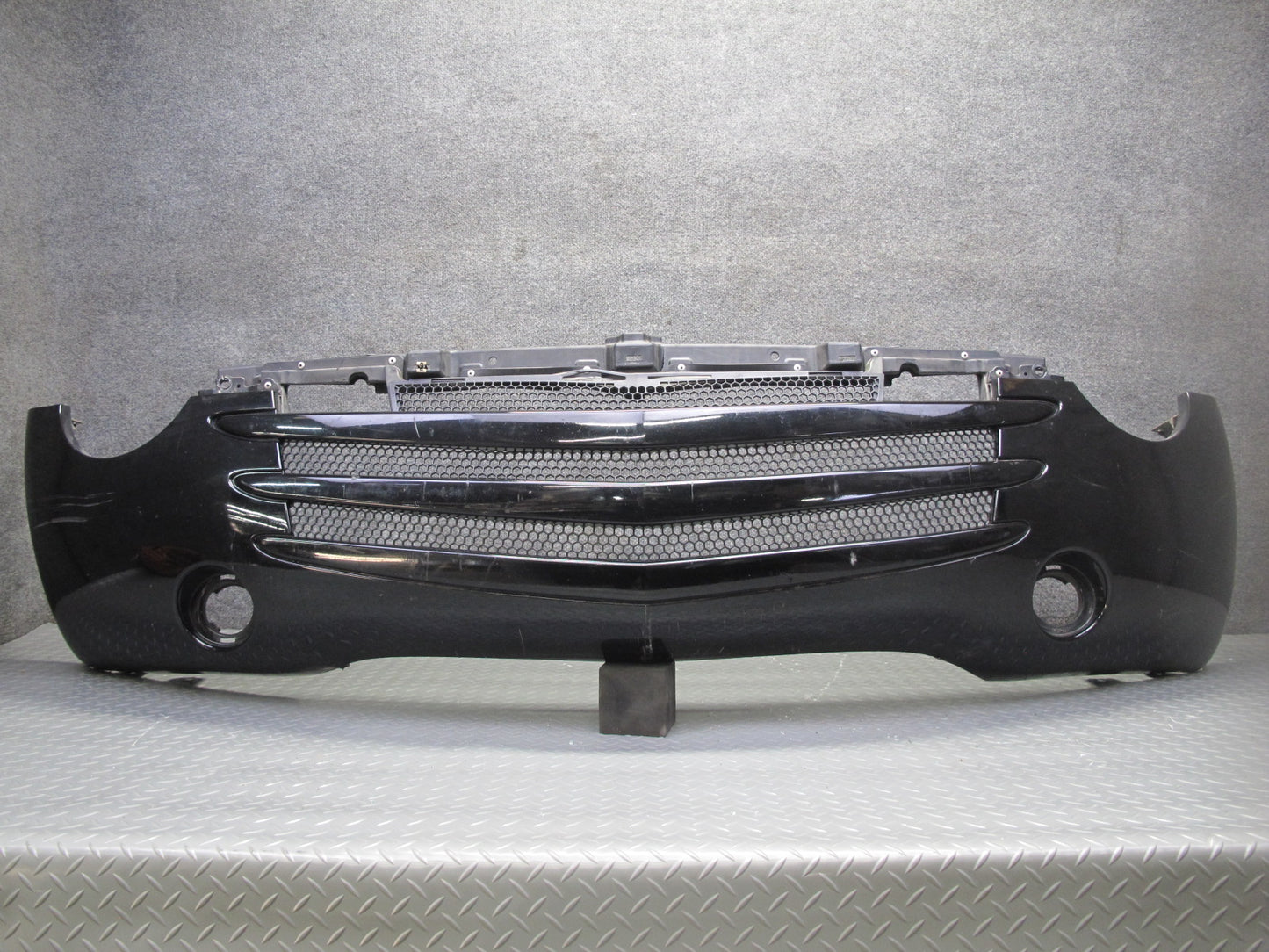 03-06 Chevrolet SSR Front Bumper Cover Black OEM