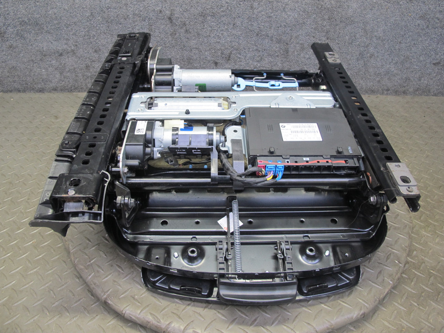 07-13 BMW E93 335i Conv Front Left Sport Seat Lower Frame Track Rail w Motor OEM