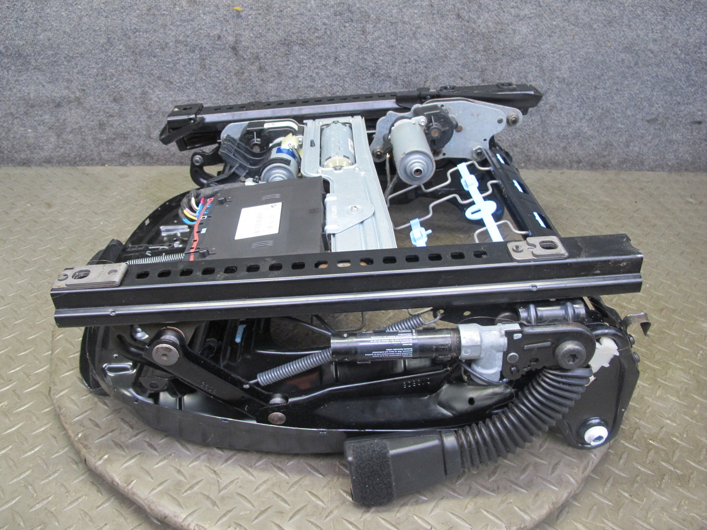 07-13 BMW E93 335i Conv Front Left Sport Seat Lower Frame Track Rail w Motor OEM