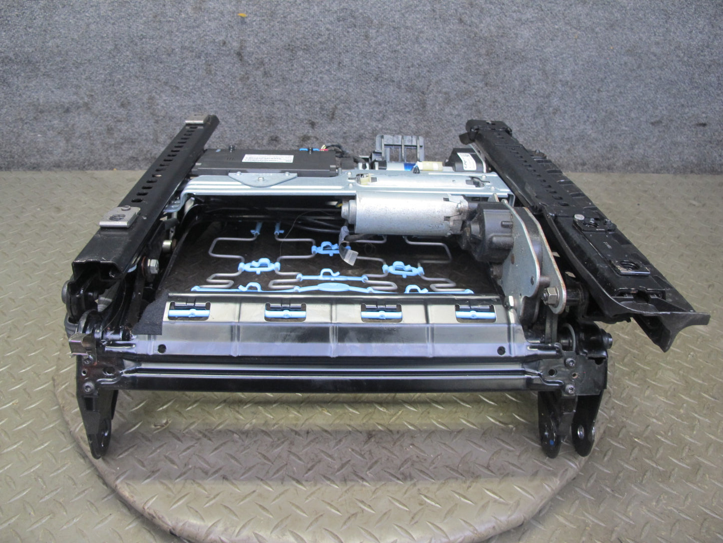 07-13 BMW E93 335i Conv Front Left Sport Seat Lower Frame Track Rail w Motor OEM