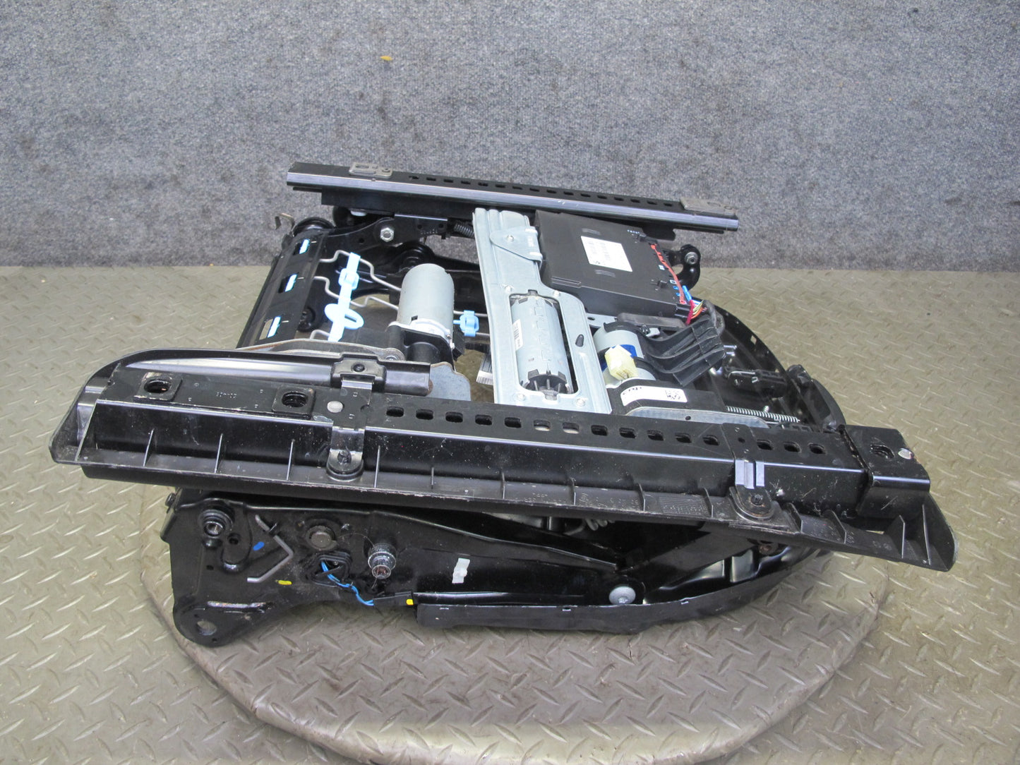 07-13 BMW E93 335i Conv Front Left Sport Seat Lower Frame Track Rail w Motor OEM