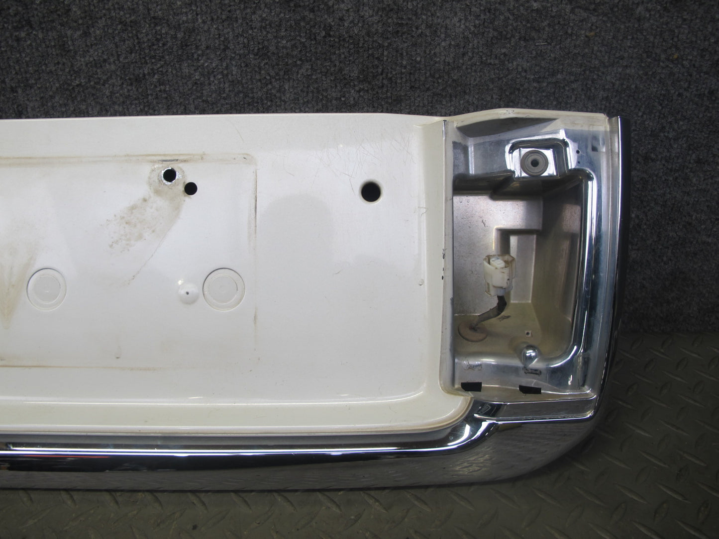 2003-2007 Lexus UZJ100L LX470 Rear Trunk Lid License Plate Molding Panel