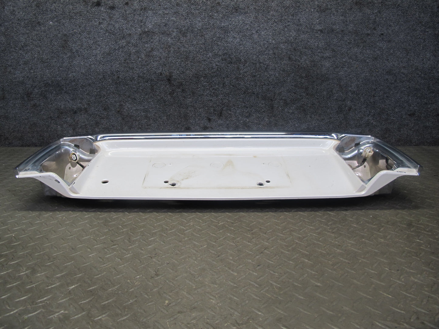 2003-2007 Lexus UZJ100L LX470 Rear Trunk Lid License Plate Molding Panel