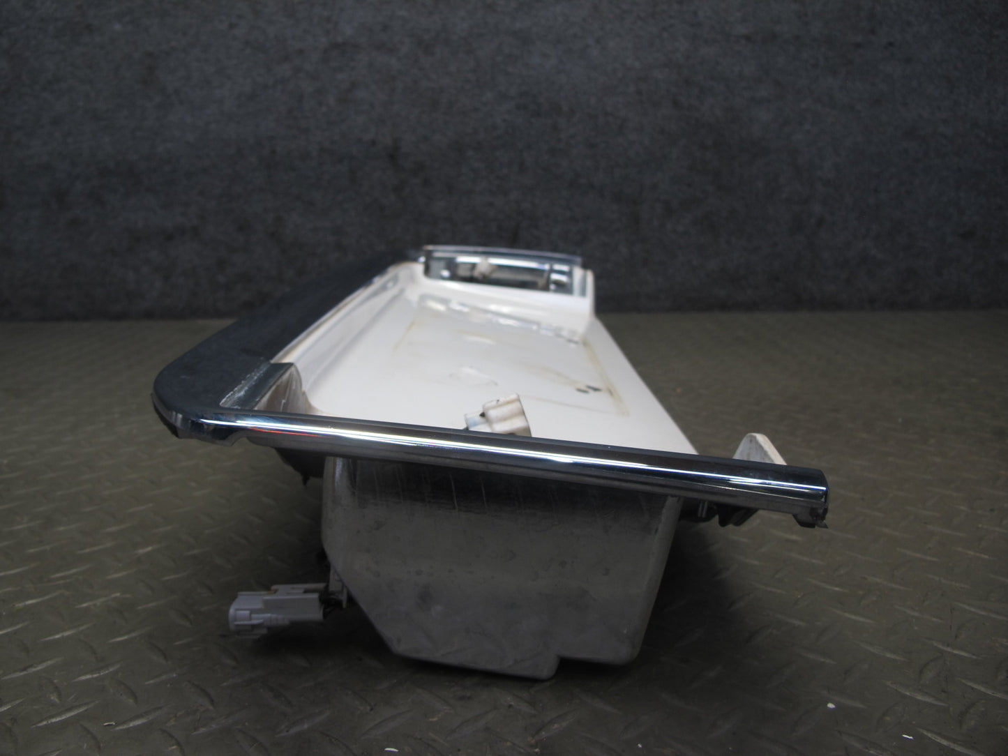 2003-2007 Lexus UZJ100L LX470 Rear Trunk Lid License Plate Molding Panel