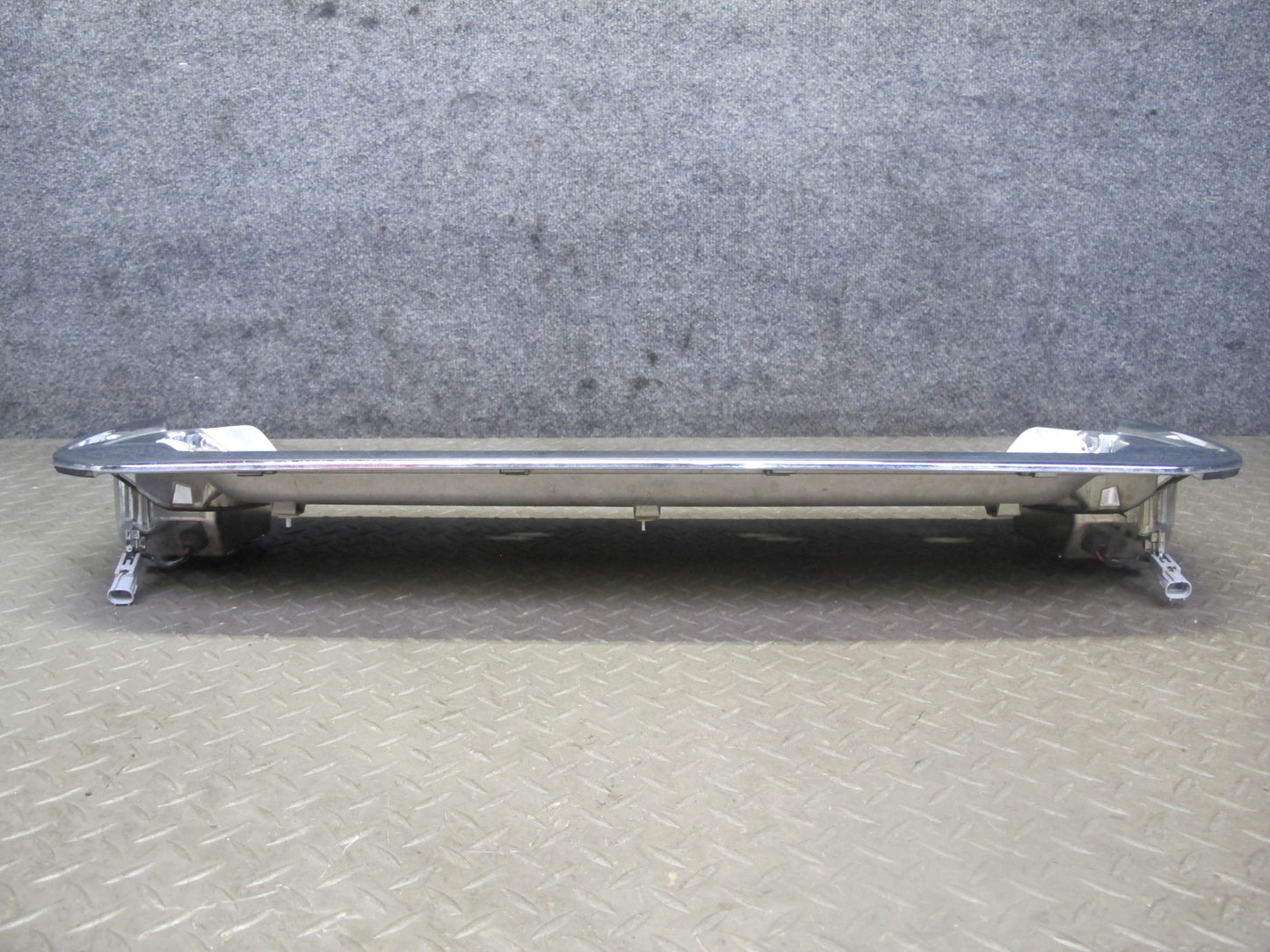 2003-2007 Lexus UZJ100L LX470 Rear Trunk Lid License Plate Molding Panel