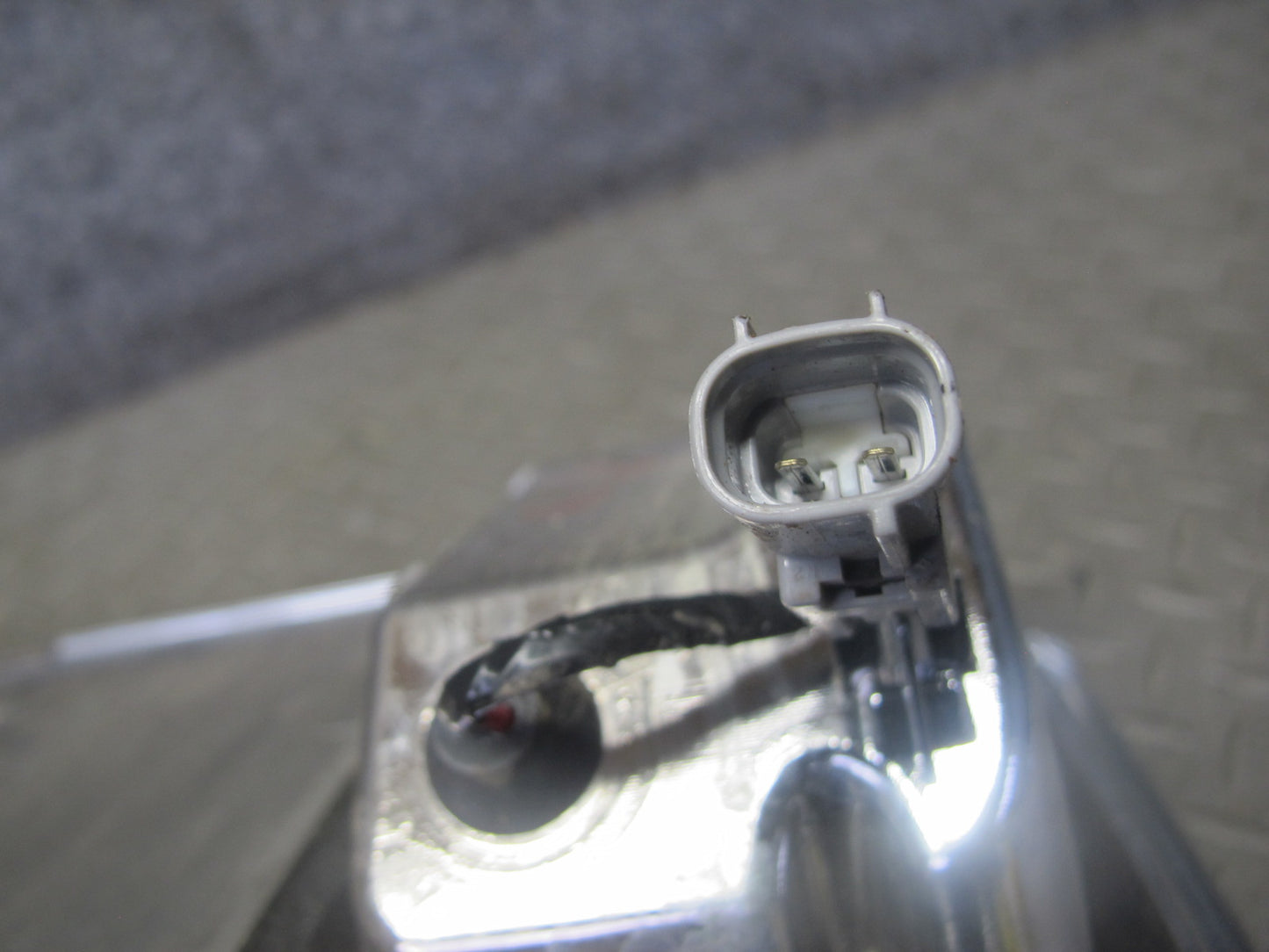 2003-2007 Lexus UZJ100L LX470 Rear Trunk Lid License Plate Molding Panel