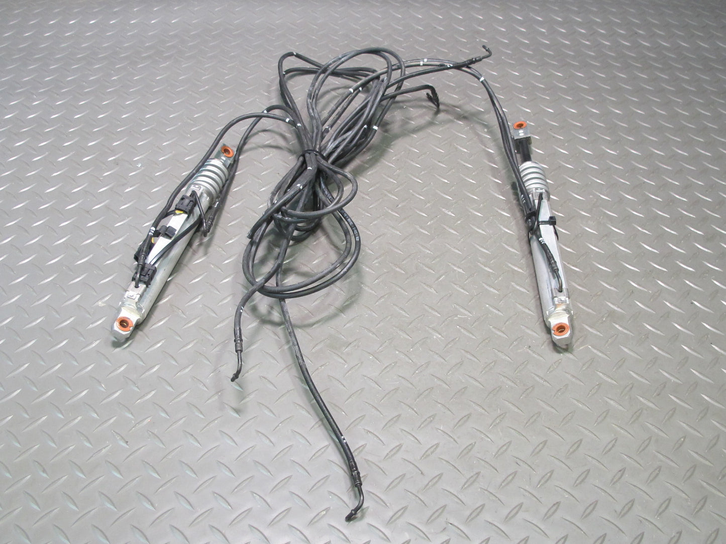 07-13 BMW E93 335i Convertible Left & Right Roof Tray Hydraulic Cylinder Set OEM