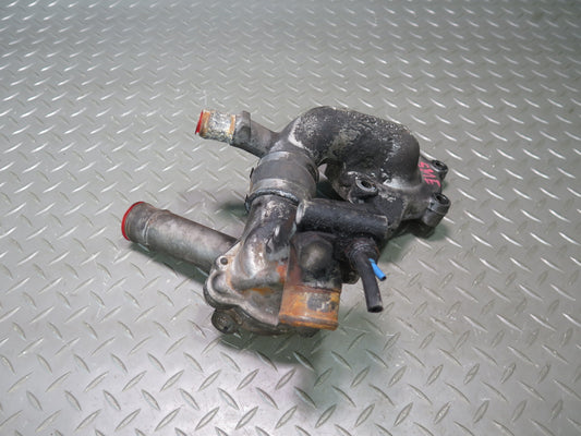 81-83 Mercedes W123 240D 616.912 Engine Thermostat & Water Pump Housing Assy OEM