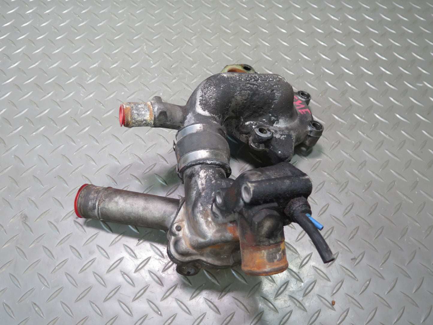 81-83 Mercedes W123 240D 616.912 Engine Thermostat & Water Pump Housing Assy OEM