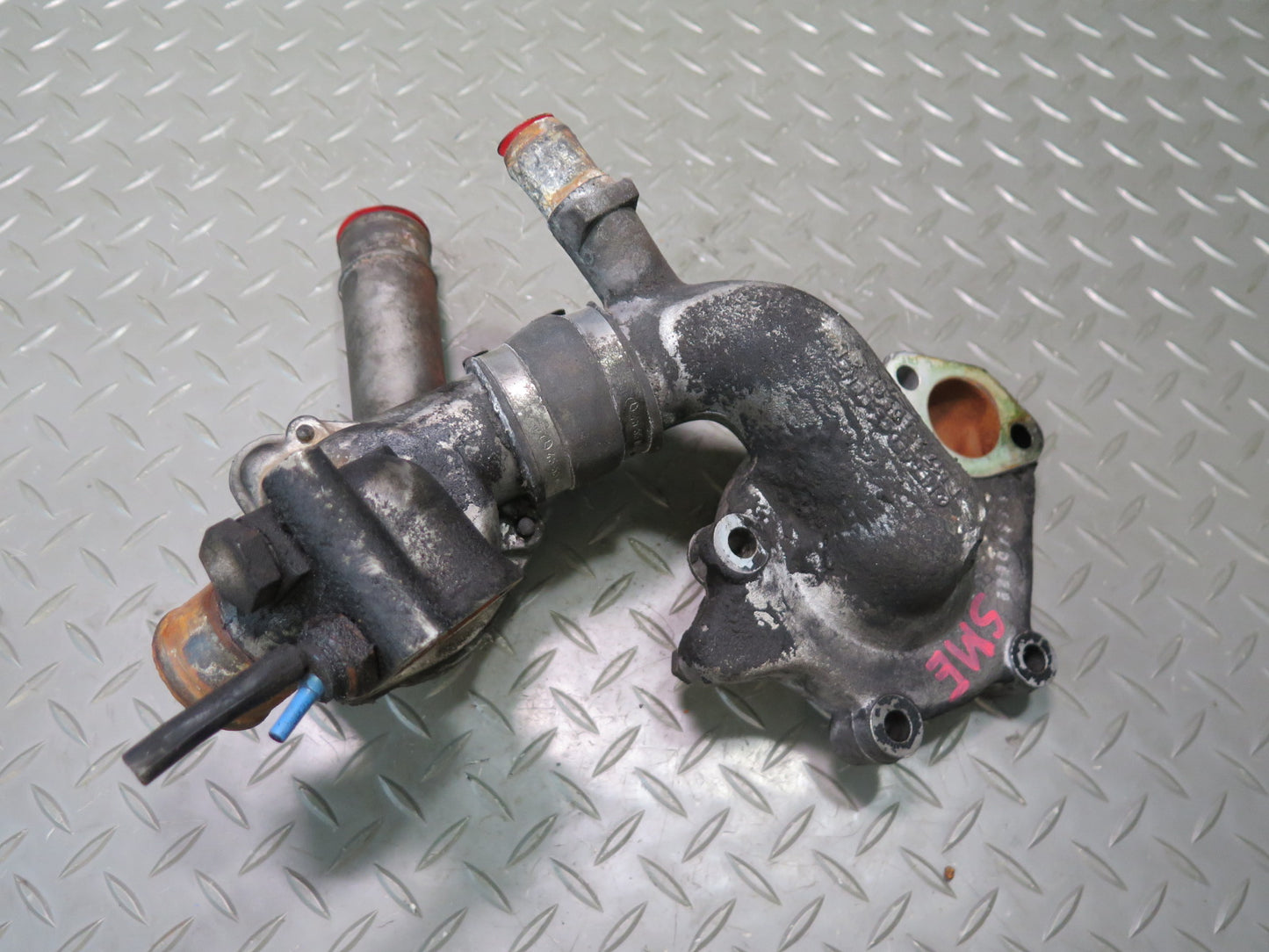 81-83 Mercedes W123 240D 616.912 Engine Thermostat & Water Pump Housing Assy OEM