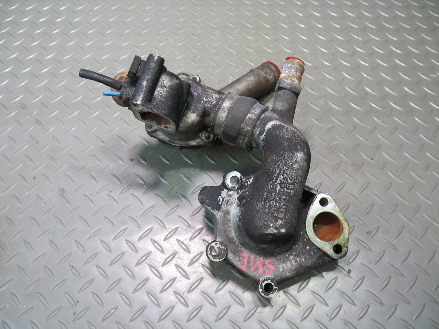 81-83 Mercedes W123 240D 616.912 Engine Thermostat & Water Pump Housing Assy OEM