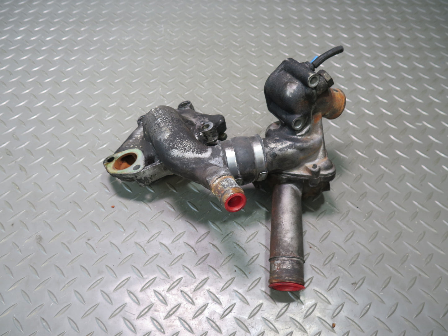 81-83 Mercedes W123 240D 616.912 Engine Thermostat & Water Pump Housing Assy OEM