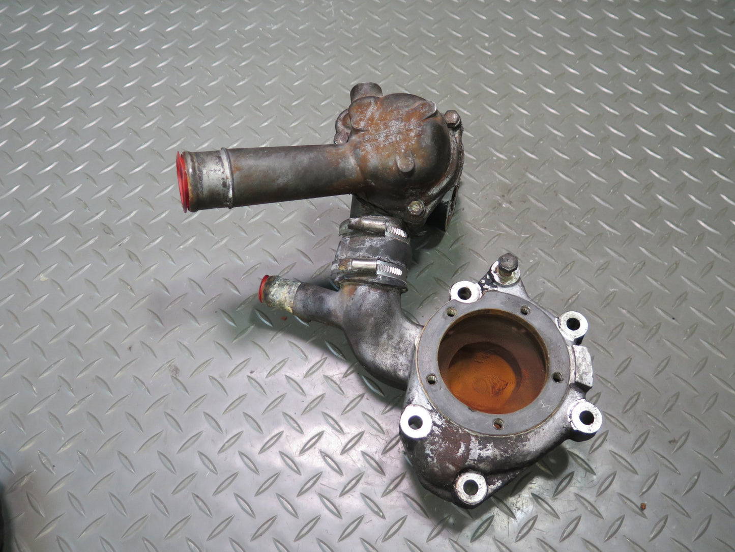 81-83 Mercedes W123 240D 616.912 Engine Thermostat & Water Pump Housing Assy OEM