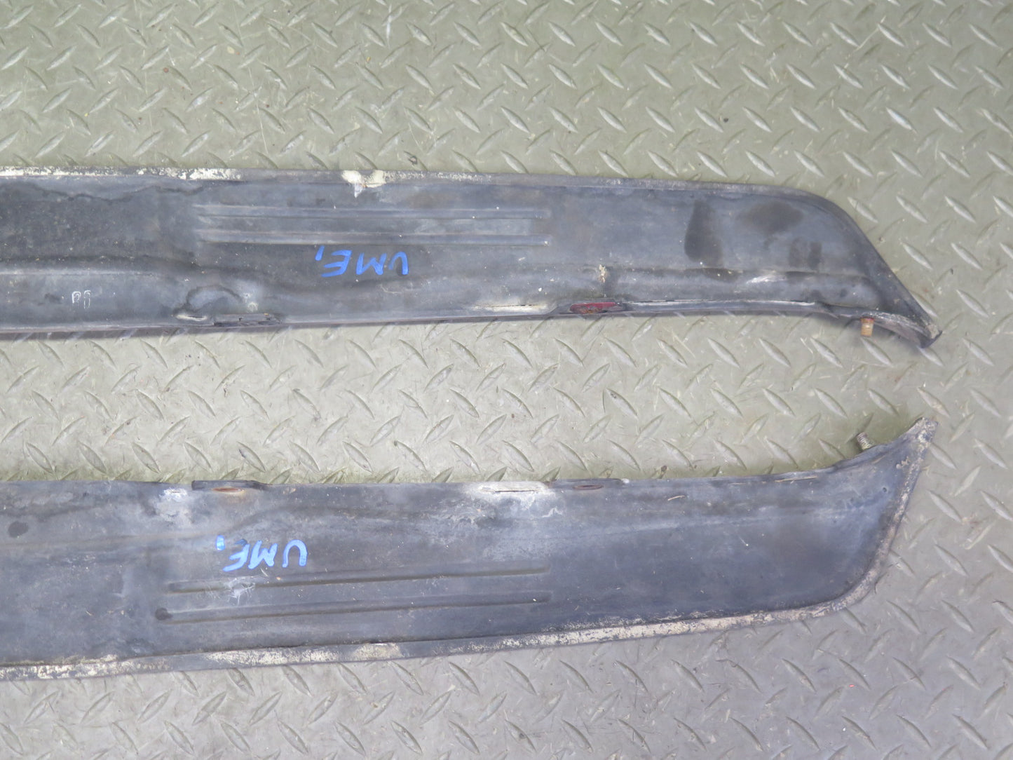 75-76 Mercedes W115 300SD Front Left & Right Bumper Filler Cover Molding Set OEM