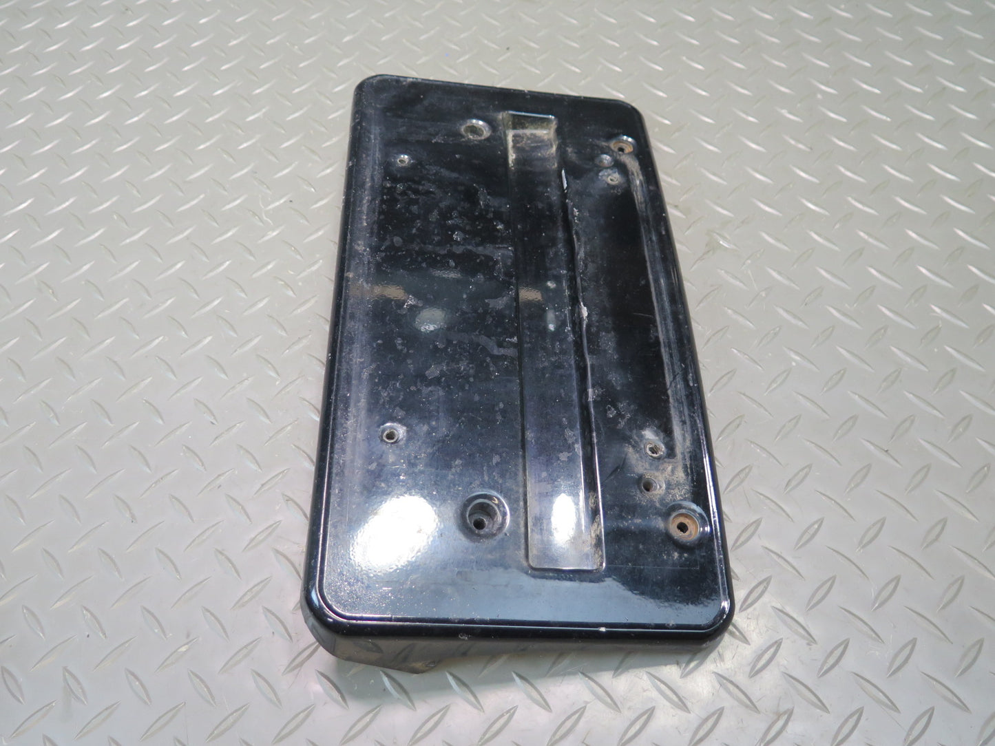 01-06 BMW E46 330ci Front Bumper License Plate Cover Panel Black 7065471 OEM