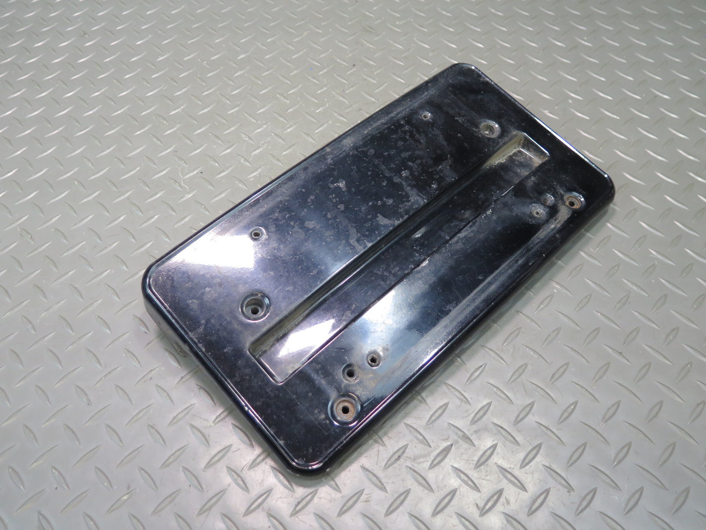 01-06 BMW E46 330ci Front Bumper License Plate Cover Panel Black 7065471 OEM