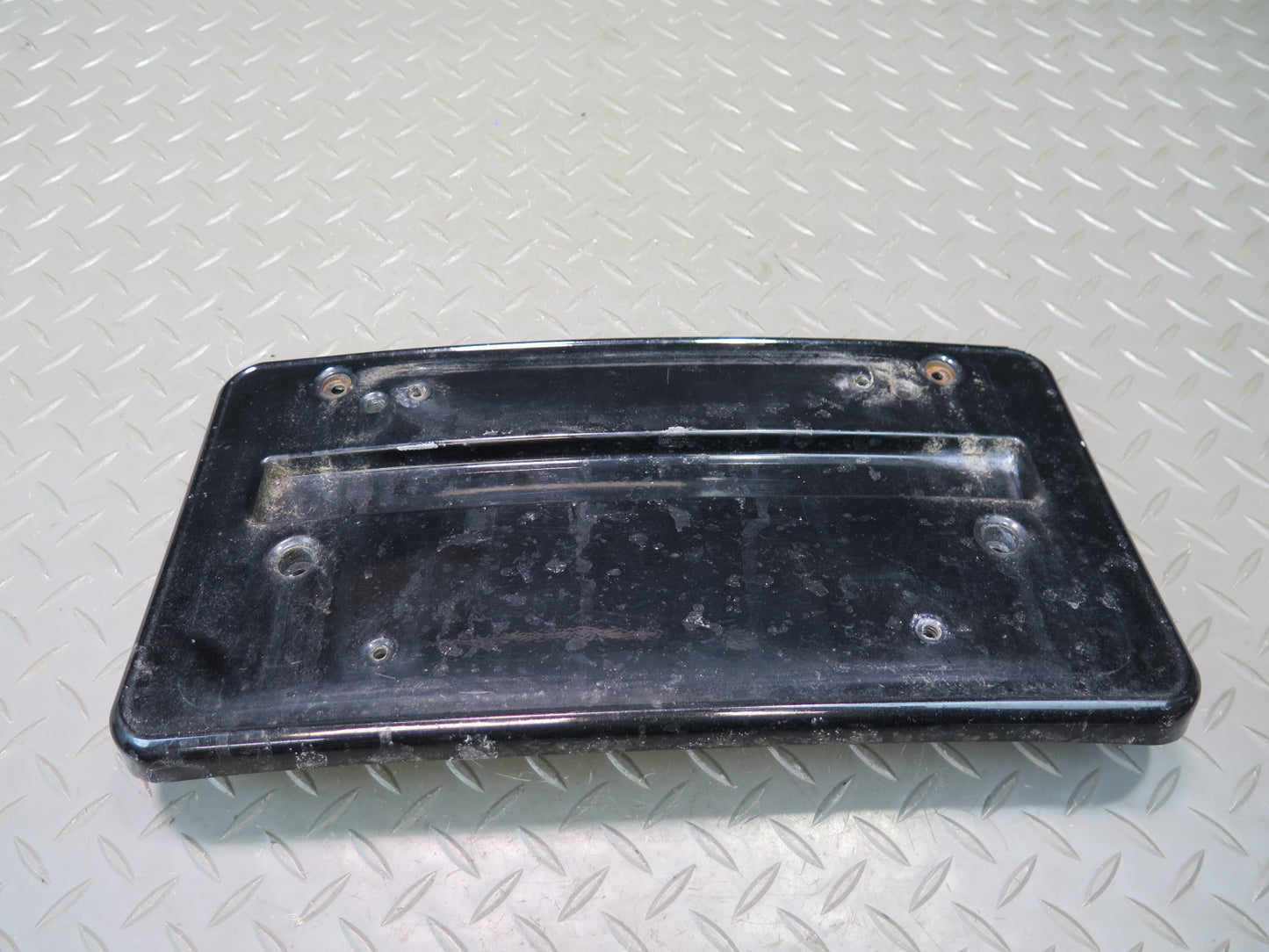 01-06 BMW E46 330ci Front Bumper License Plate Cover Panel Black 7065471 OEM